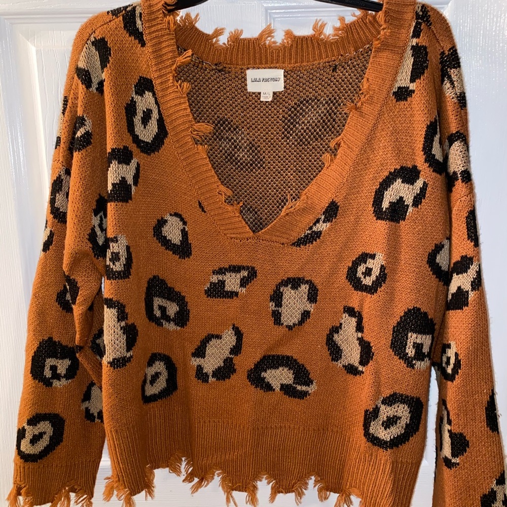 Distressed sweater